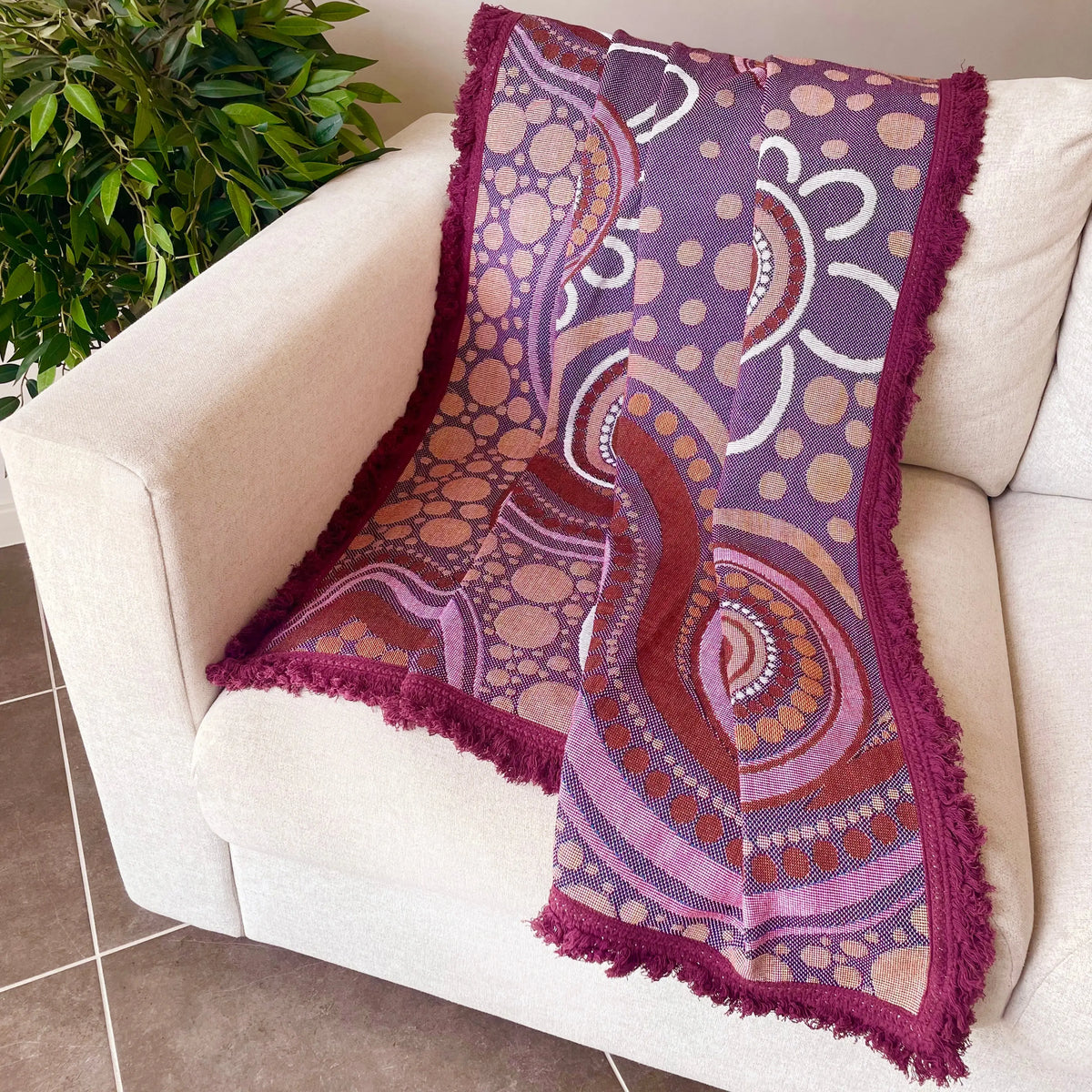 Sand Dreaming Cotton Throw in reading corner — Indigenous art throw creating a warm cultural atmosphere in early childhood learning space