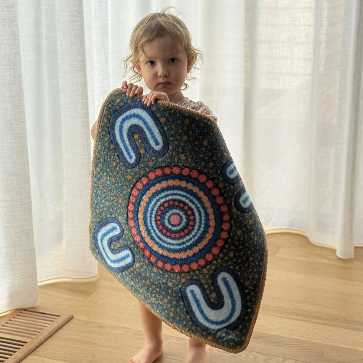 Indigenous Symbols Rug Squares arranged in classroom — modular Aboriginal art rug squares for yarning circles and group learning activities