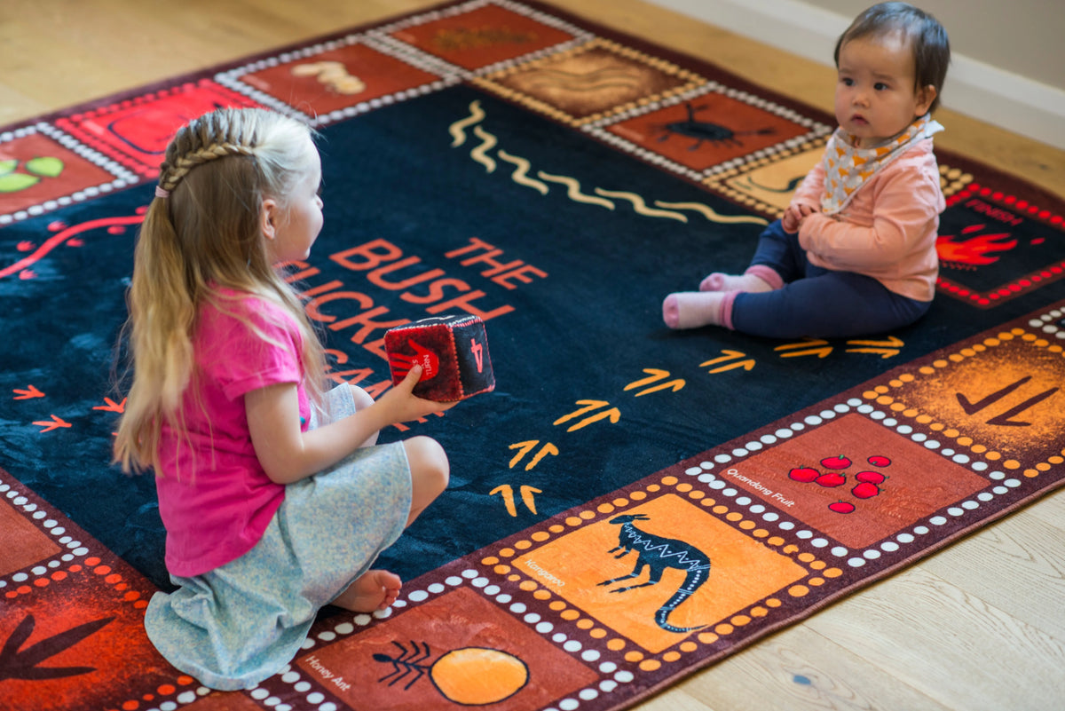 Bush Tucker Indigenous rug — children playing on rug during group activity