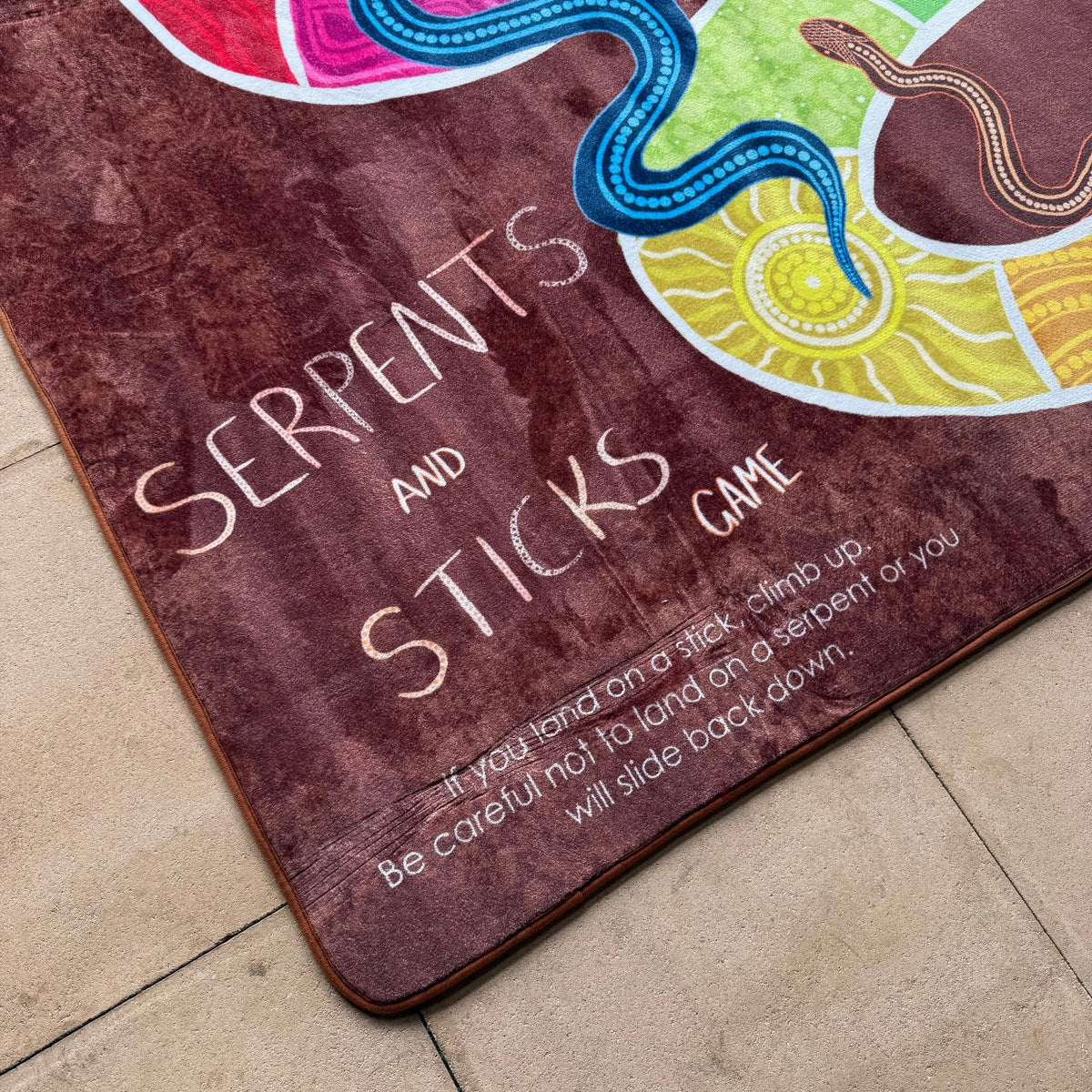 Serpents and Sticks Rug Game with soft Dice — additional classroom view