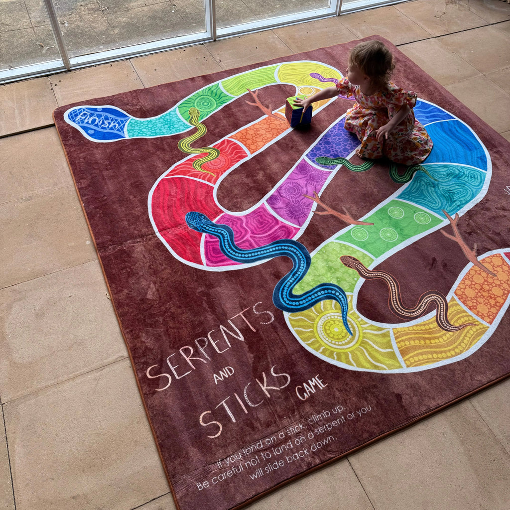 Serpents and Sticks Rug Game with soft Dice — second classroom view