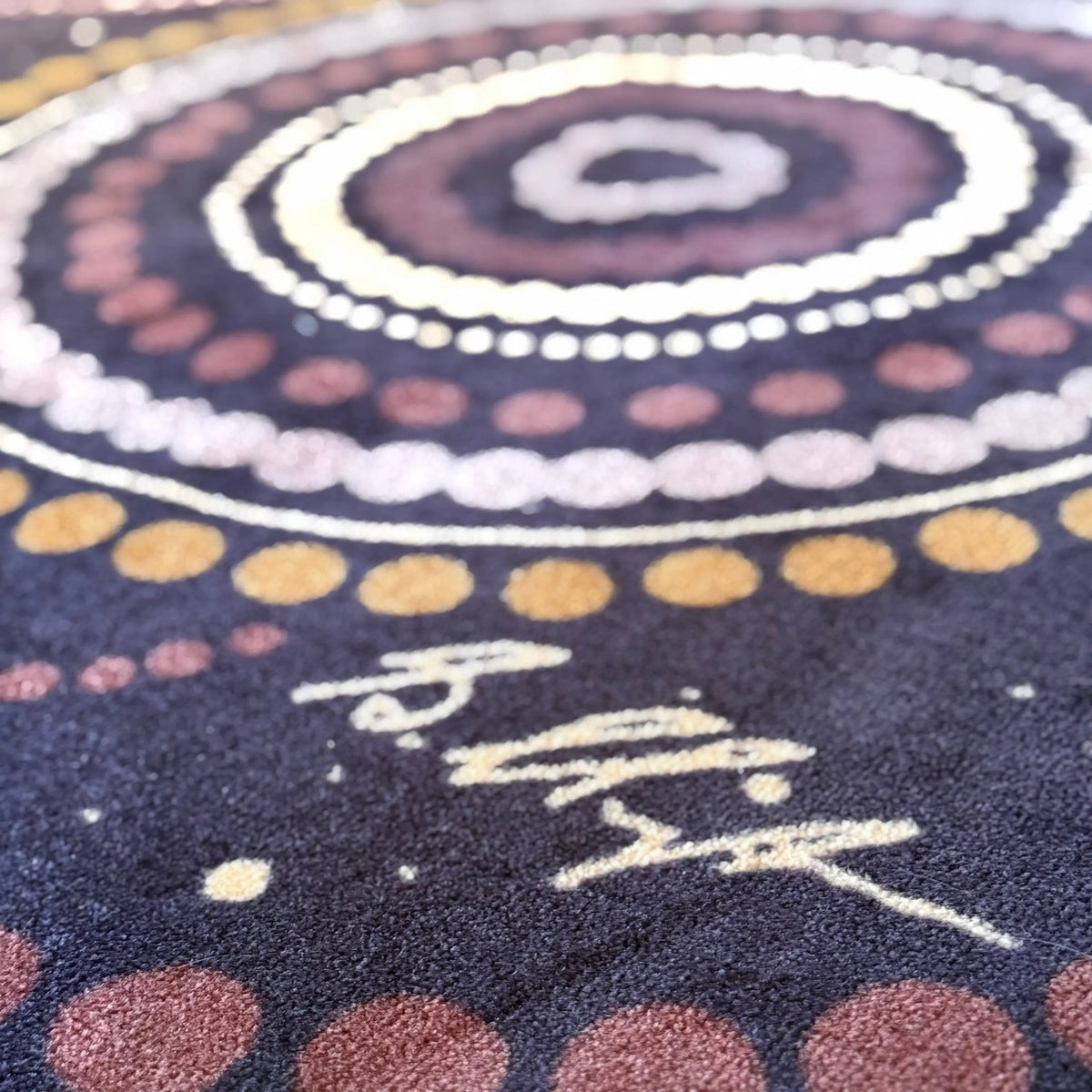 Emu in the Sky rug close-up detail showing Aboriginal art design celebrating the Emu in the Sky constellation — bestselling classroom rug