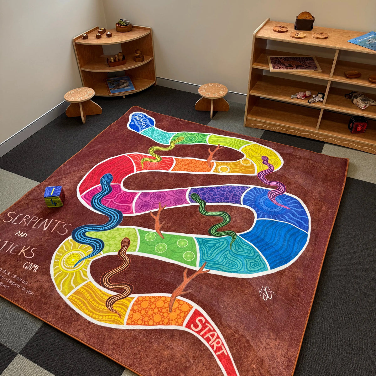 Serpents and Sticks rug full design view — captivating Aboriginal art classroom rug game by Kiz Costelloe celebrating Dreamtime traditions