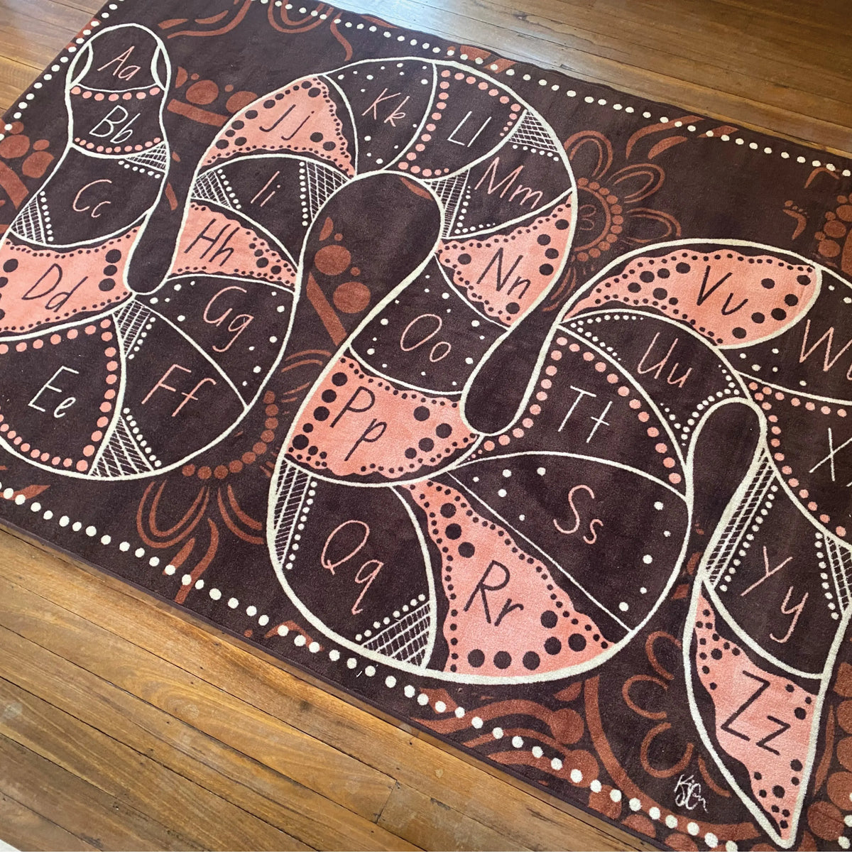Alphabet Earth Serpent Dreaming rug full design view — premium soft pile Indigenous art literacy rug for Australian early childhood settings