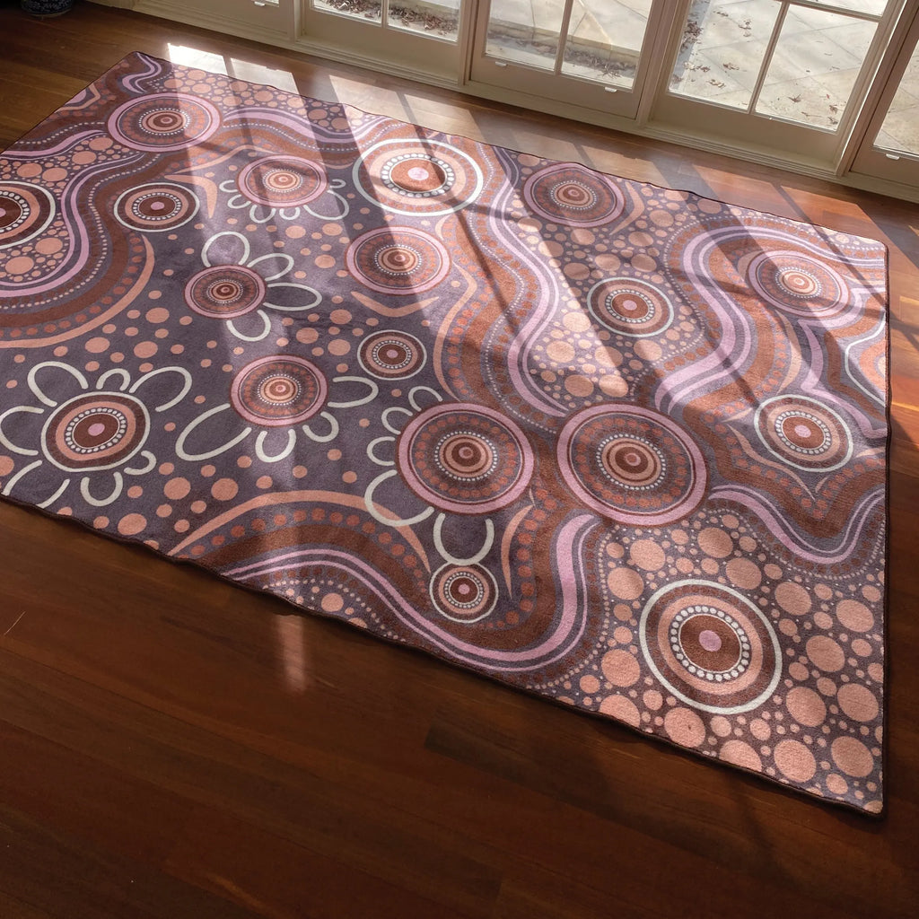 Aboriginal Art Sand Dreaming rug close-up detail showing Aboriginal dot art sand drawing design by Kiz Costelloe
