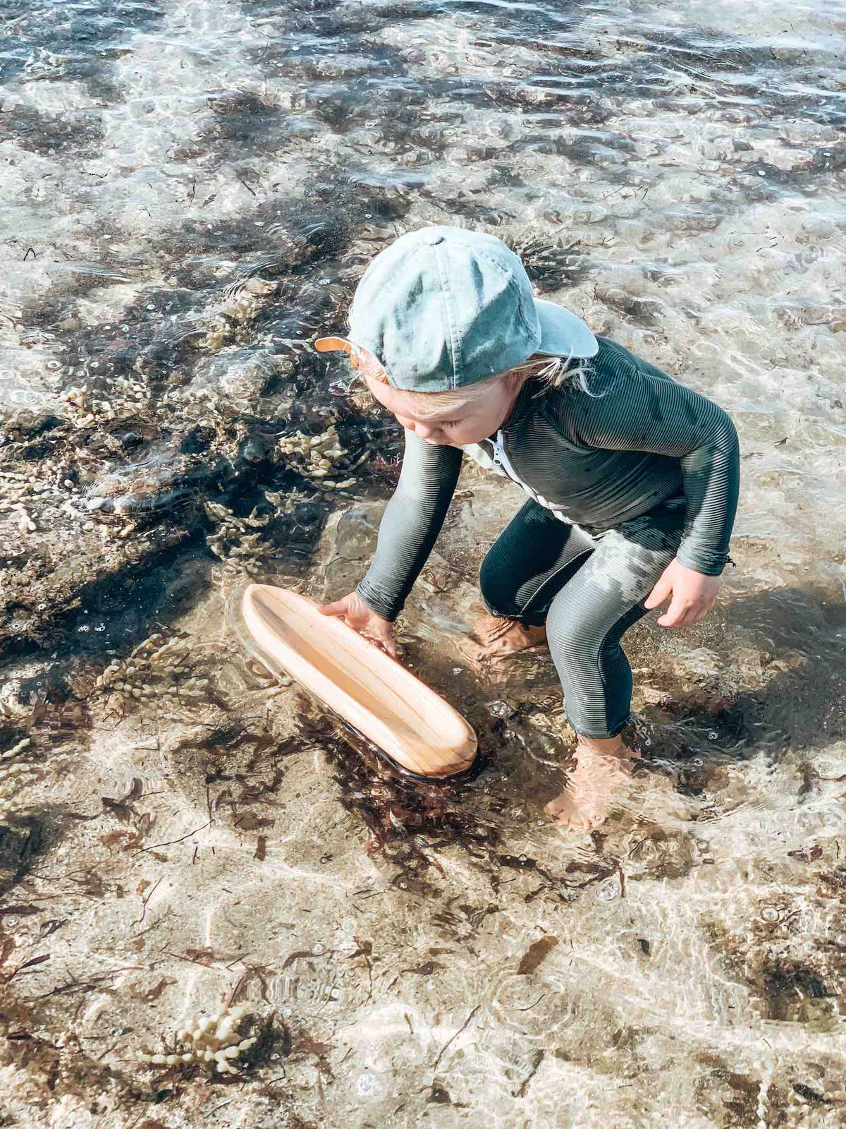 Wooden Toy Boat Canoe — side view of canoe