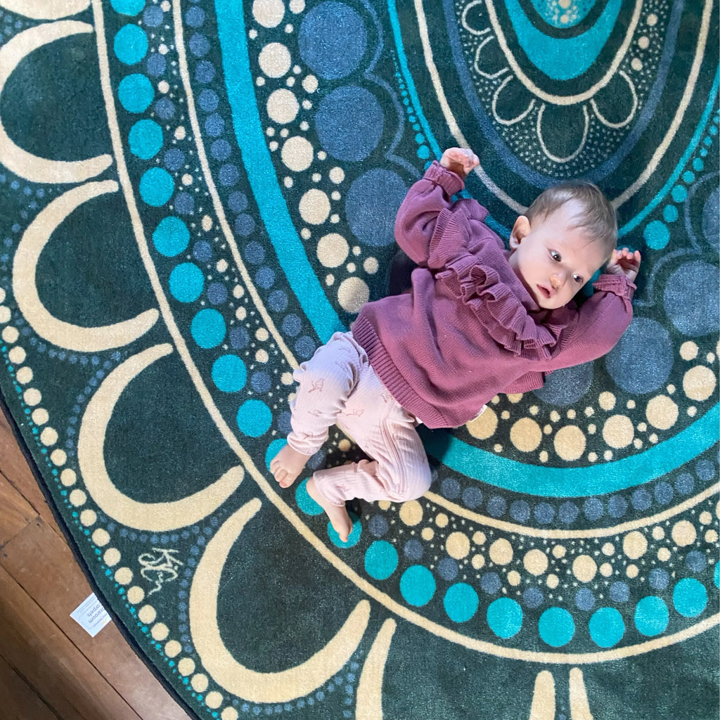 Yarning Oval Indigenous Rug — in classroom group time