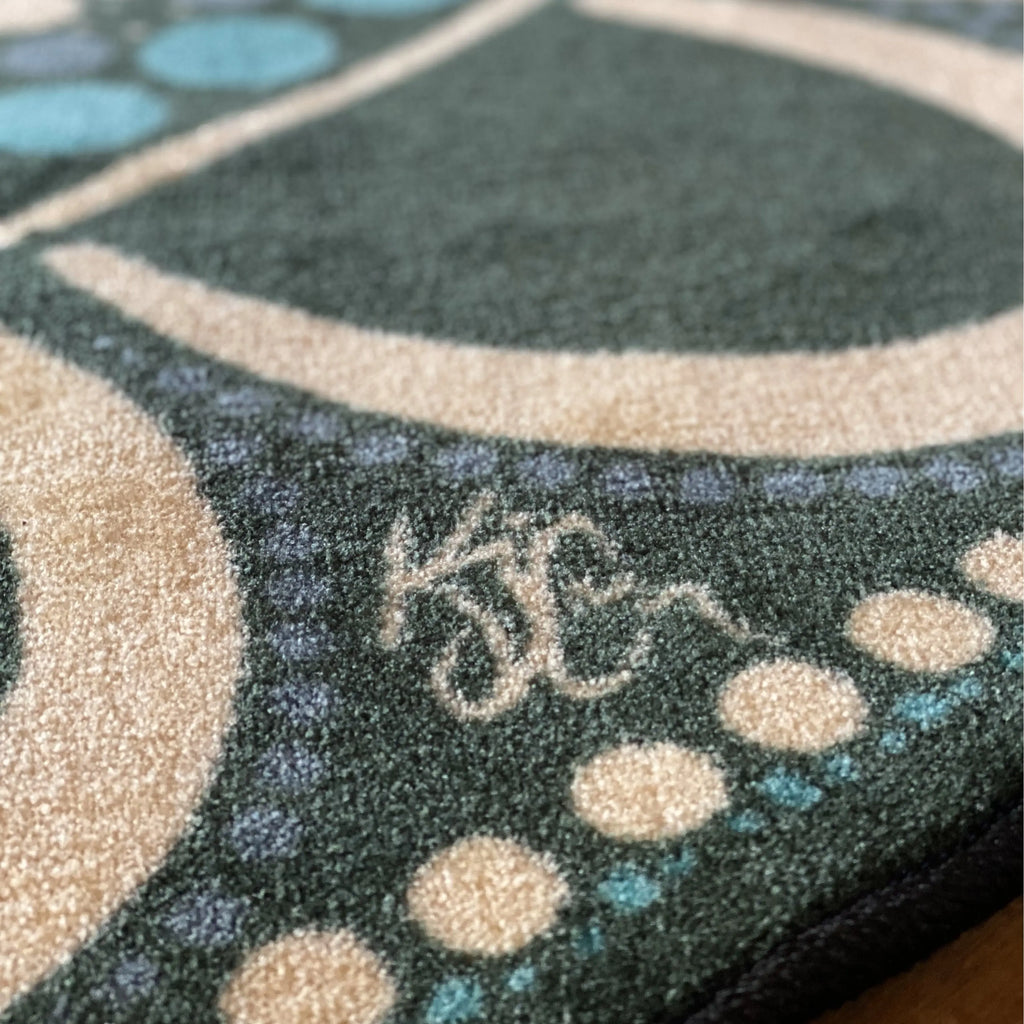 Yarning Oval Indigenous Rug — alternative dot art design close-up