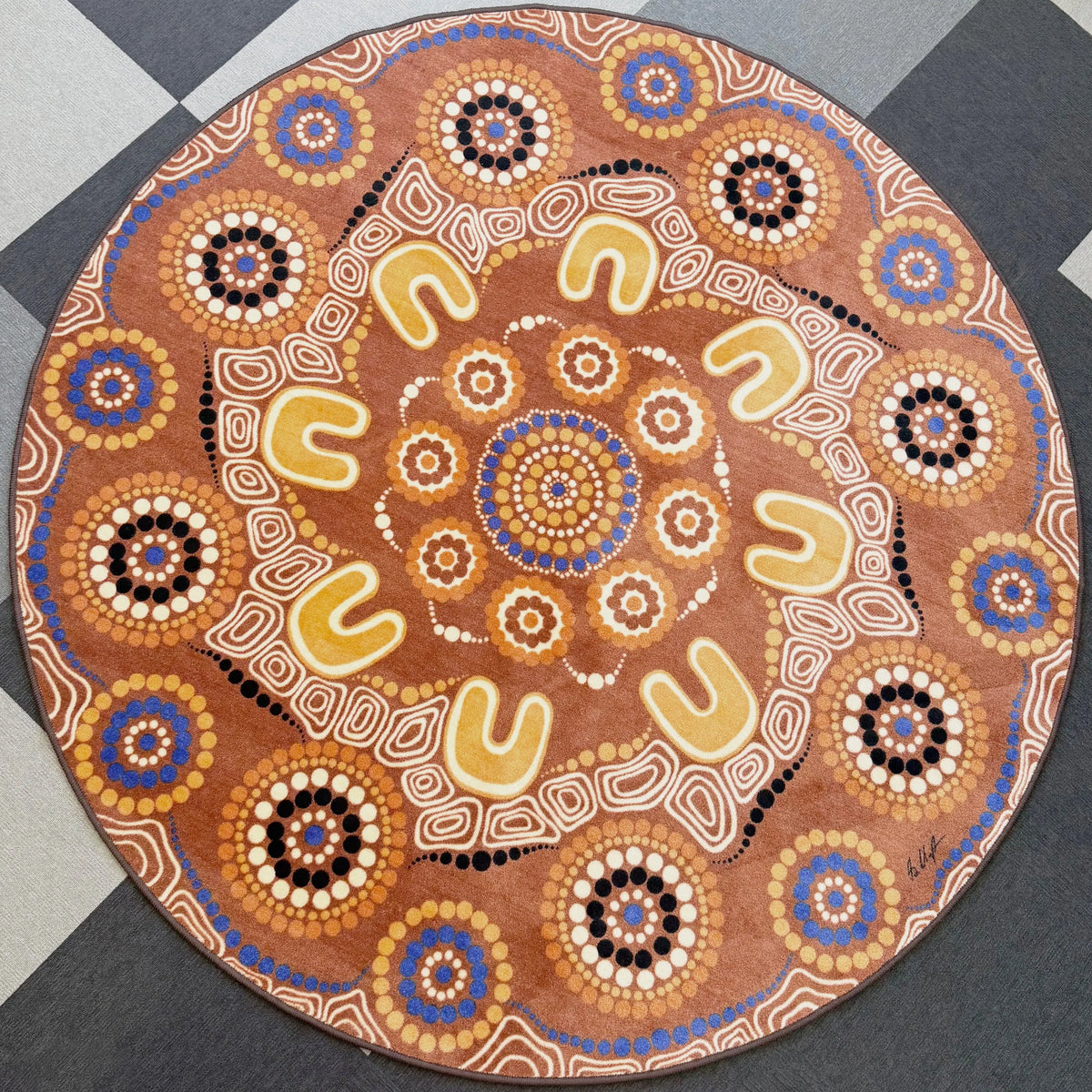 Yarning Camp classroom rug — Aboriginal art rug by Shareen Clayton creating a warm cultural gathering space for Australian early childhood classrooms