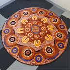 Yarning Camp rug in classroom setting — children gathered on Aboriginal art rug for group learning and yarning circle time