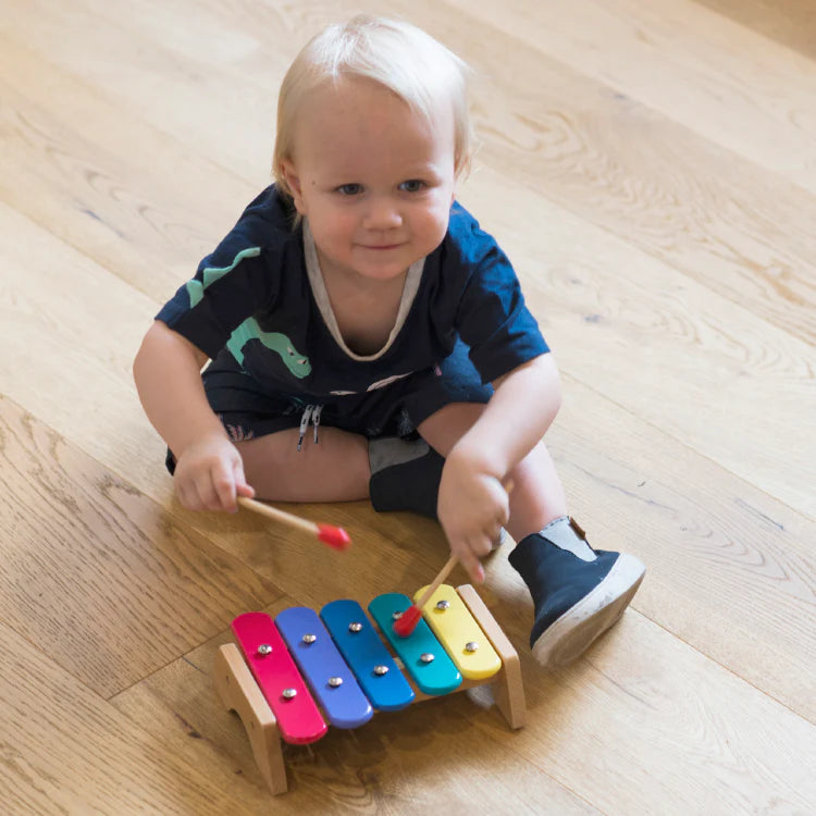 education national music and movement toddler playing with xylophone 